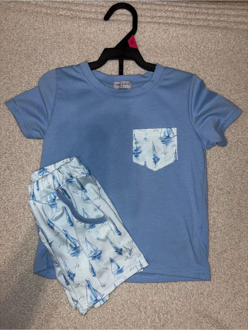 Light Blue Kids Pajama Set with Sailboat Pocket